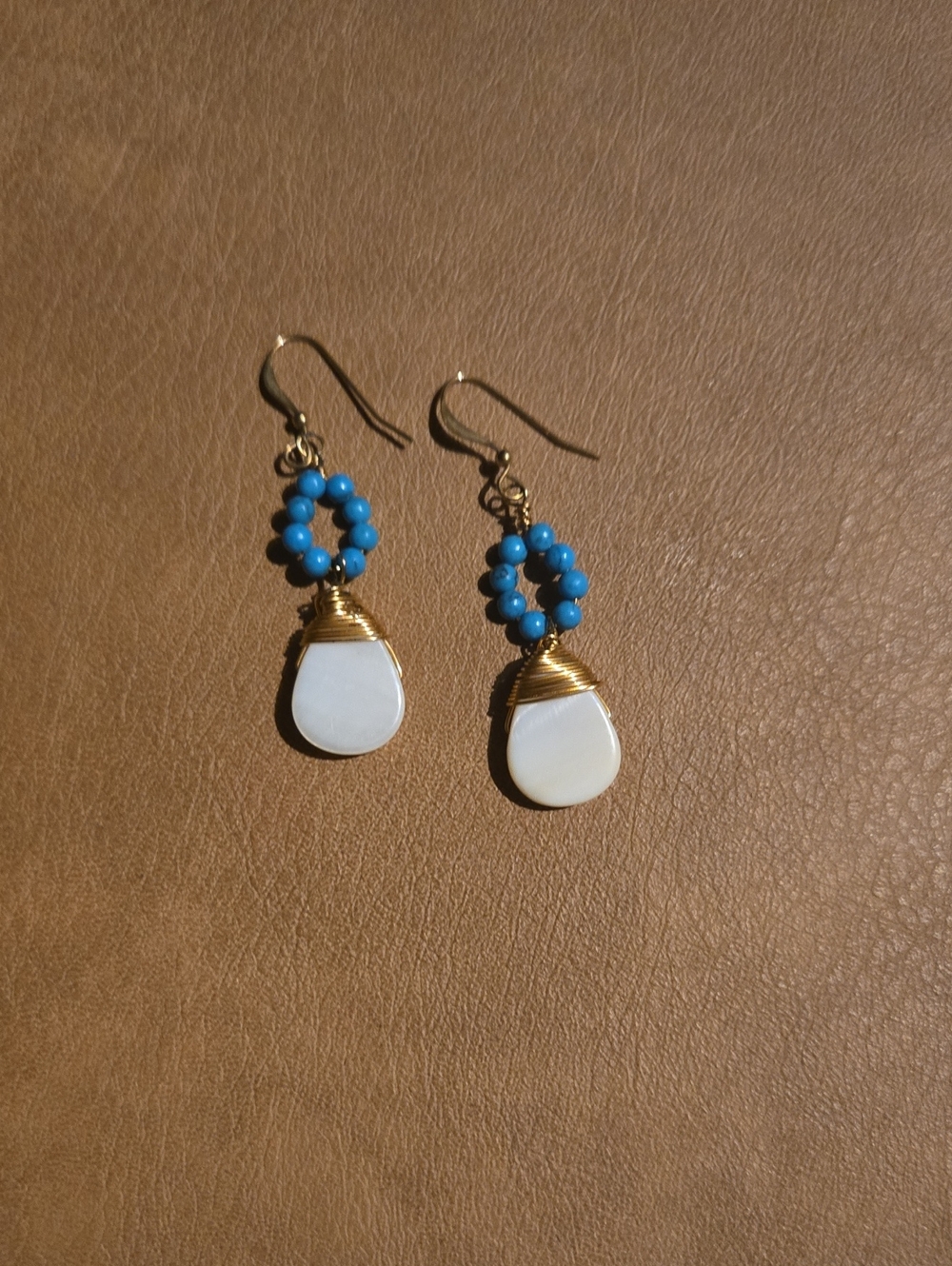 Gold Wire Blue Bead and White Teardrop Dangle Earrings